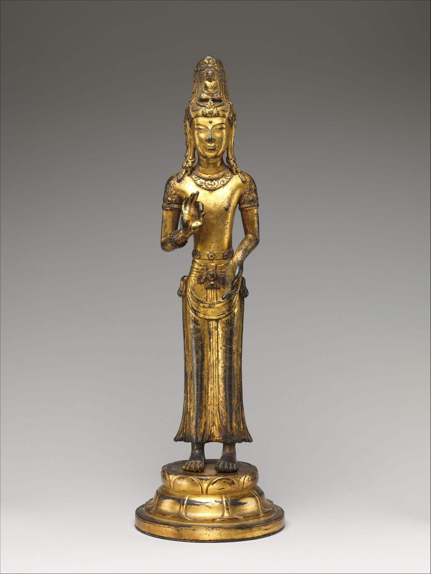 Twelfth-century gilt bronze Avalokiteshvara sculpture from the Dali kingdom with a small seated Buddha in the headdress