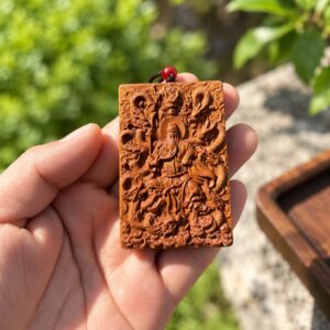 Nine-Dragon Guan Gong Wood Pendant, approved hero product view.